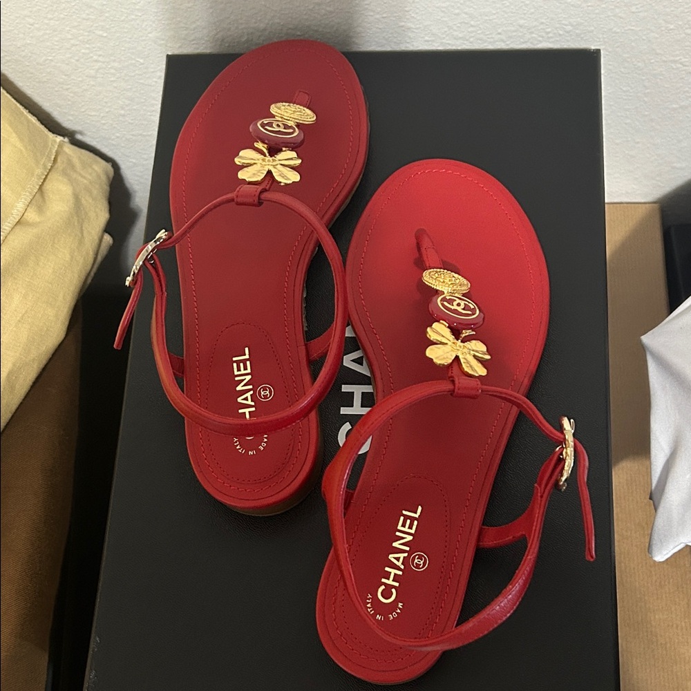 CHANEL Red Sandals with Gold Accents